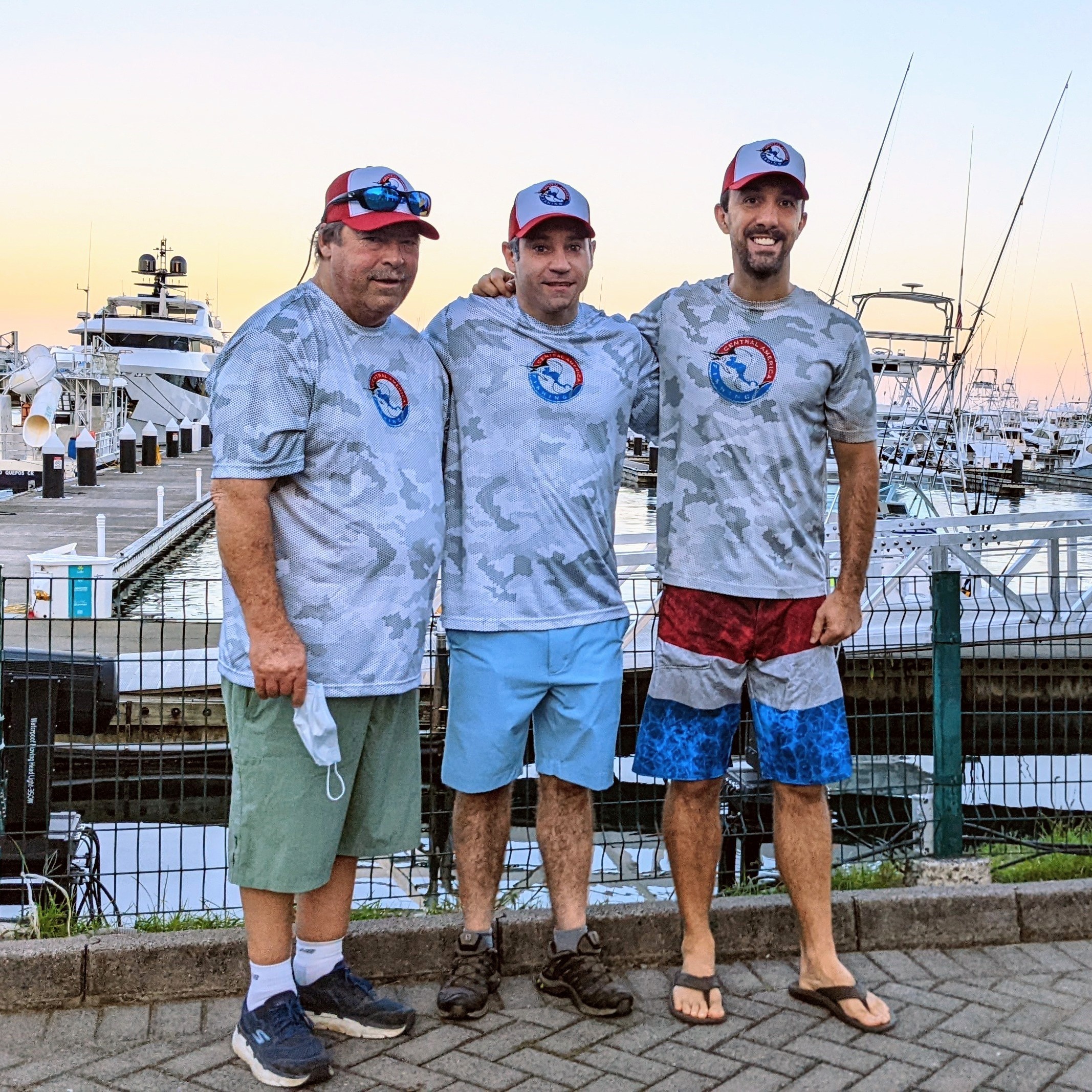 Central America Fishing owner Chris Atkins and 11x repeat customer Frank & Seth before the Rooster Rodeo in Quepos