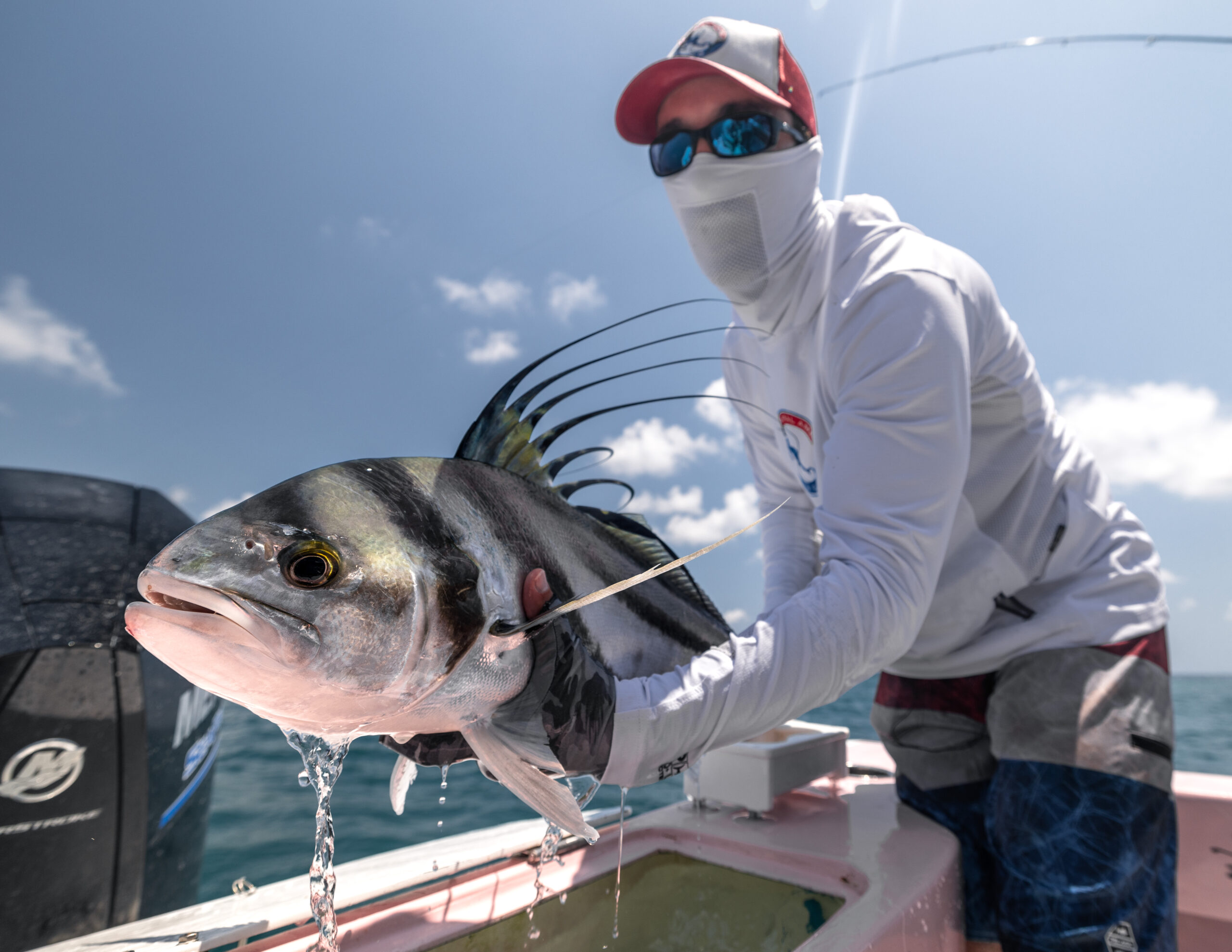 Central America Fishing owner Chris Atkins releases a roosterfish near Quepos