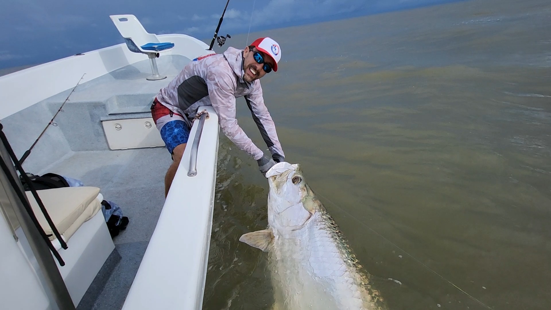 Central America Fishing owner Chris Atkins releases a roosterfish near Quepos